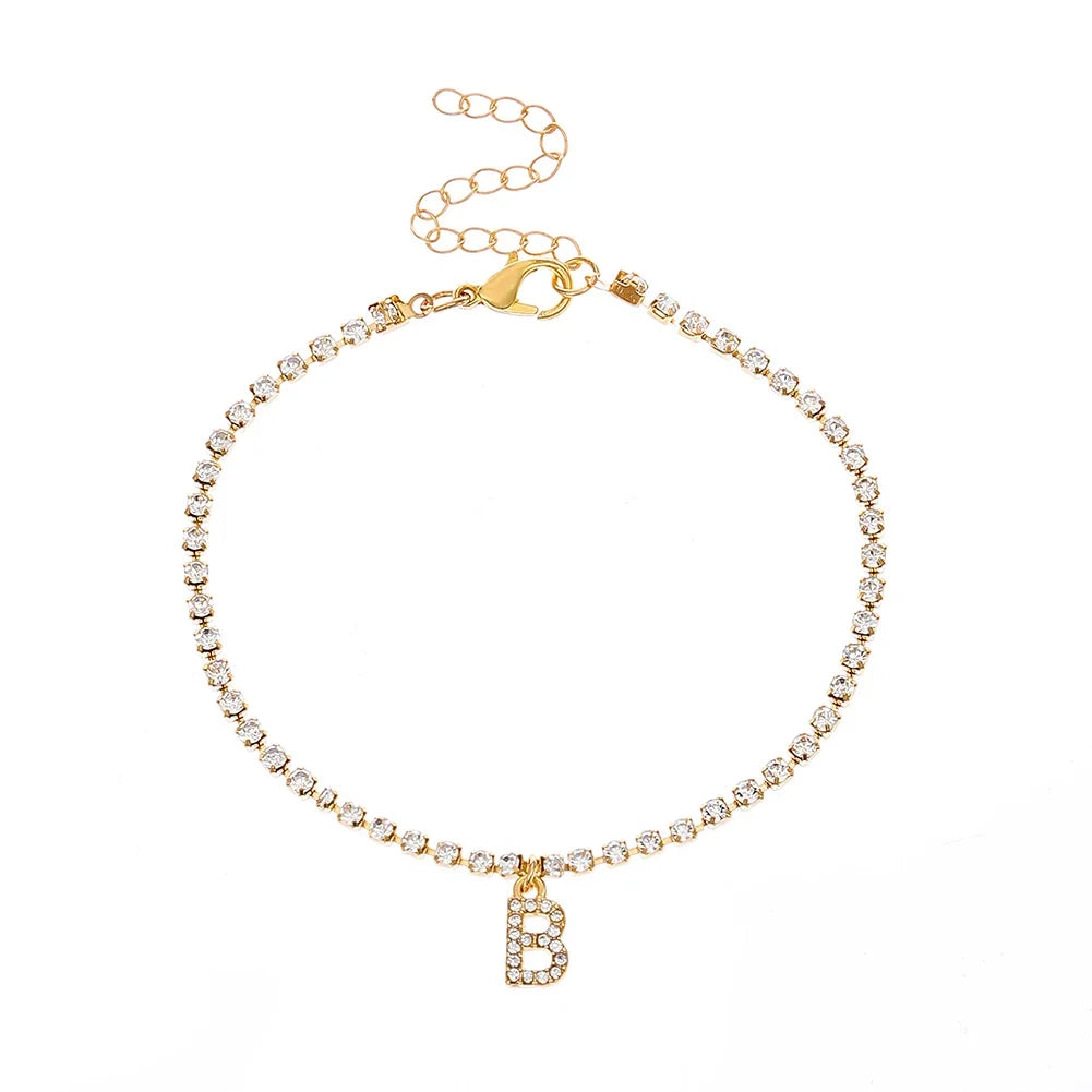 Chevillère Alphabet Brillante 💎
Lettre Initiale Strass – Bijou de Cheville Bohème Femme
