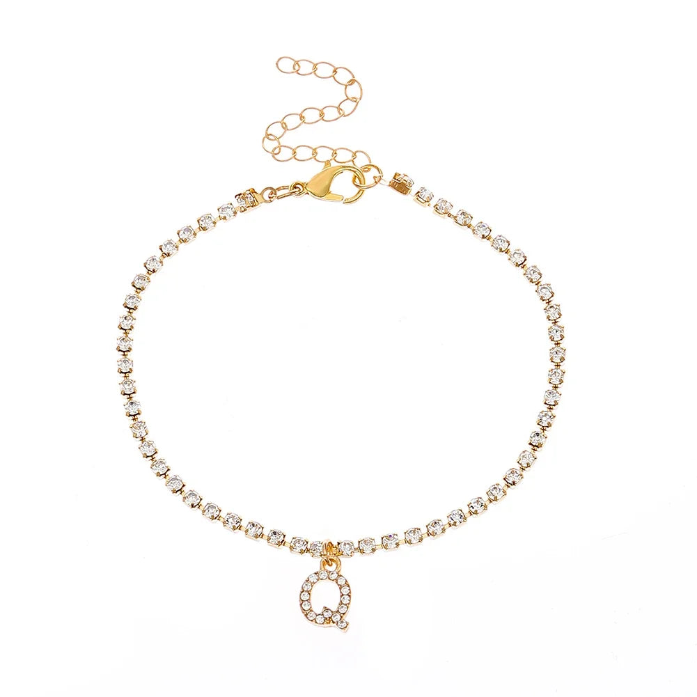 Chevillère Alphabet Brillante 💎
Lettre Initiale Strass – Bijou de Cheville Bohème Femme