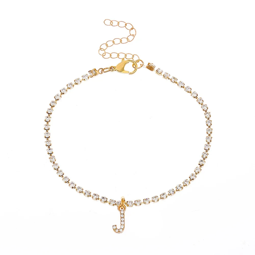 Chevillère Alphabet Brillante 💎
Lettre Initiale Strass – Bijou de Cheville Bohème Femme