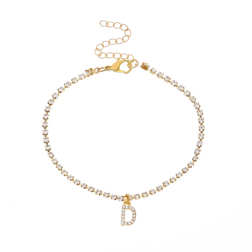 Chevillère Alphabet Brillante 💎
Lettre Initiale Strass – Bijou de Cheville Bohème Femme