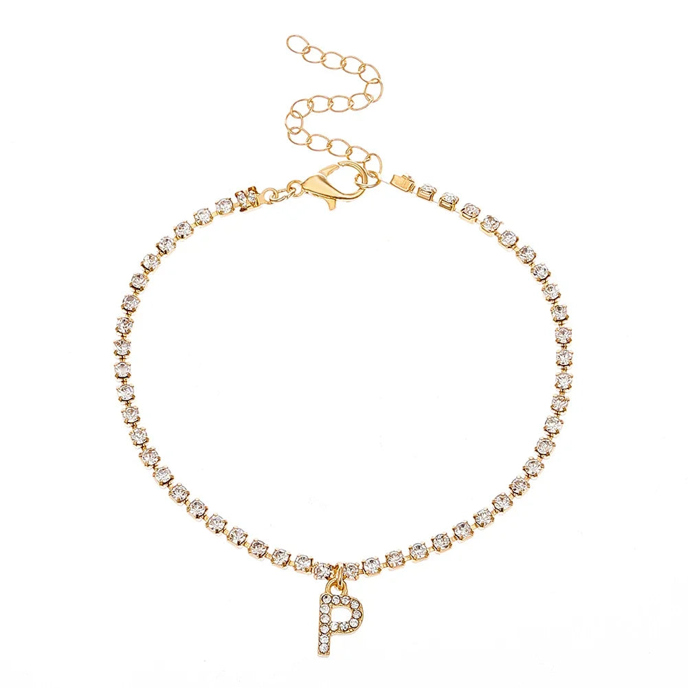 Chevillère Alphabet Brillante 💎
Lettre Initiale Strass – Bijou de Cheville Bohème Femme